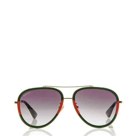 gucci sunglasses red and green|Gucci aviator style sunglasses.